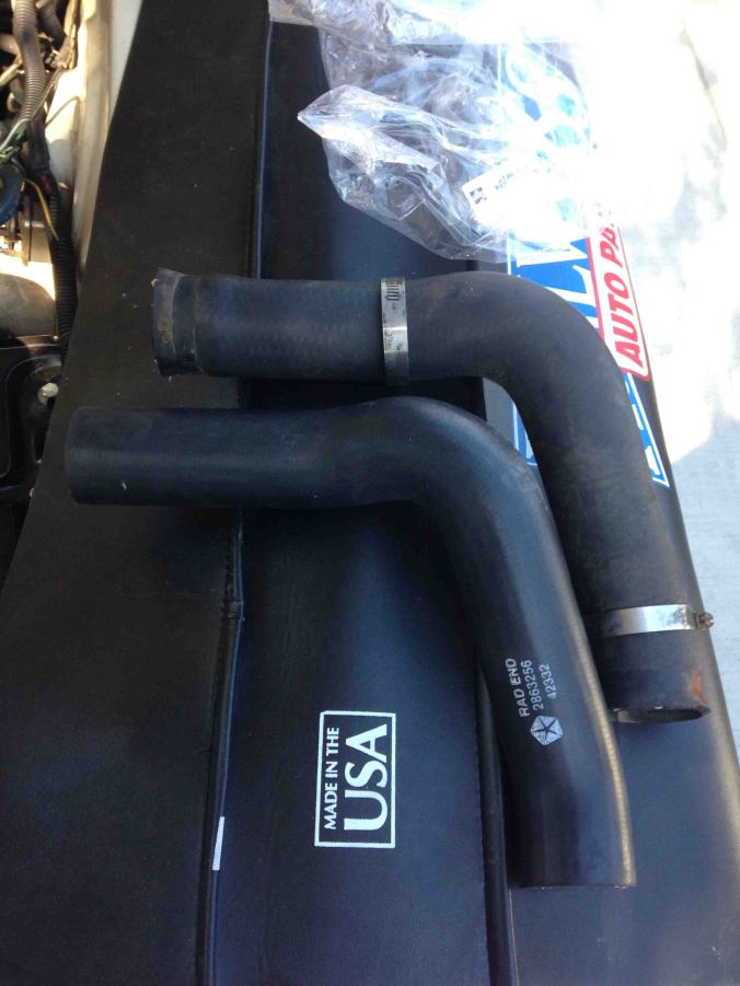 The old and new hose. New one does not have inside coils.