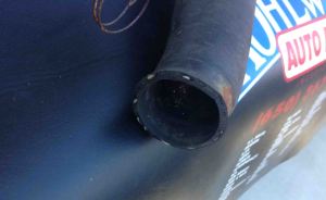 Here's the same old hose on the rad end. Clean because I suspect there are no  electrochemical reactions occurring on this end.