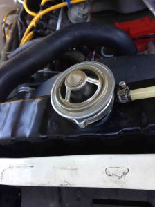 top side (radiator end) of hiflow thermostat. Removing it from system to flush engine block at high RPM.